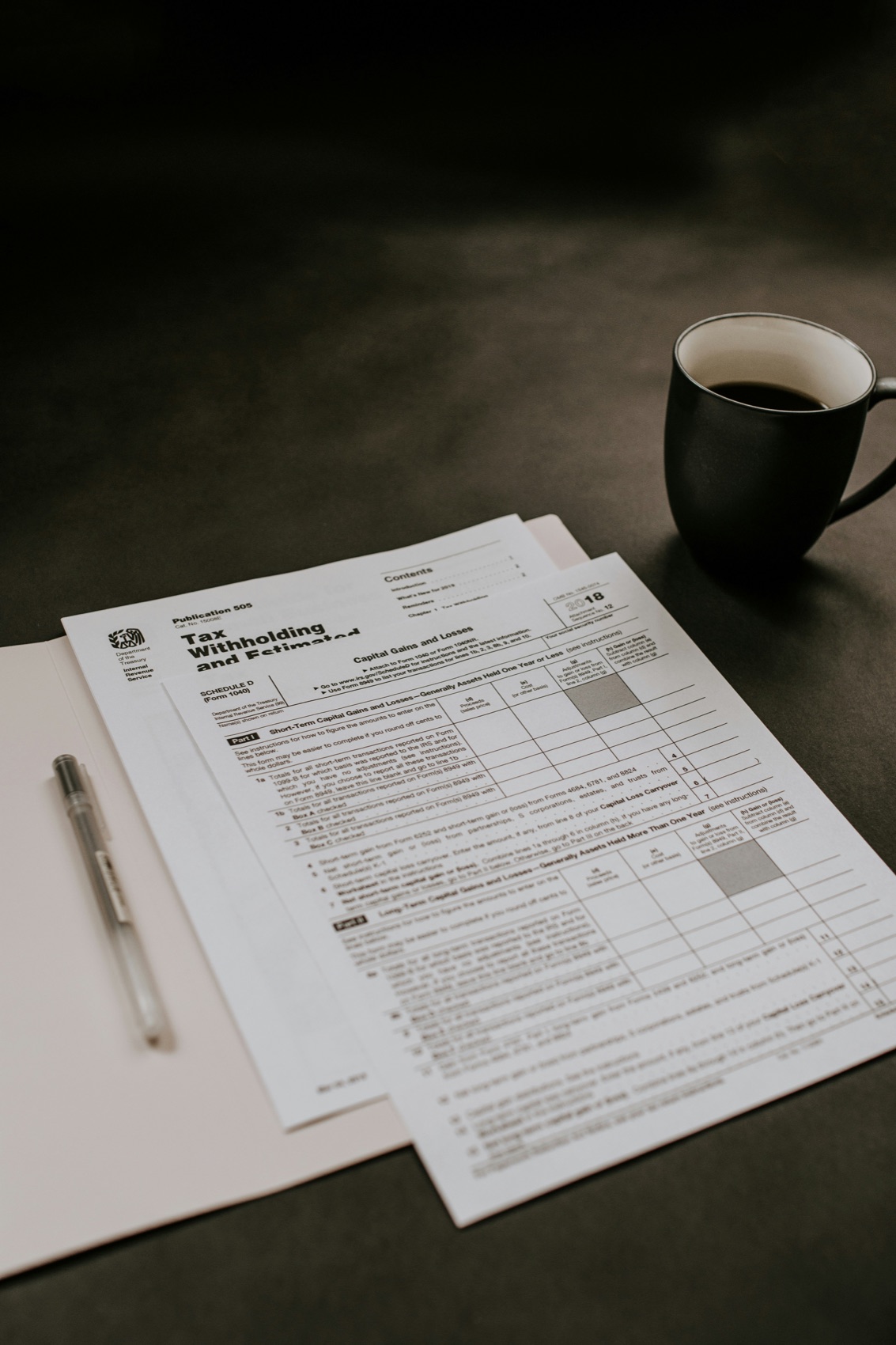 US tax forms and working papers on a desk
